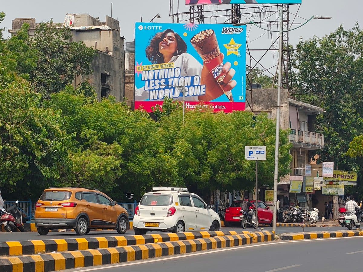 Large-format billboard installed on a high-traffic city landmark