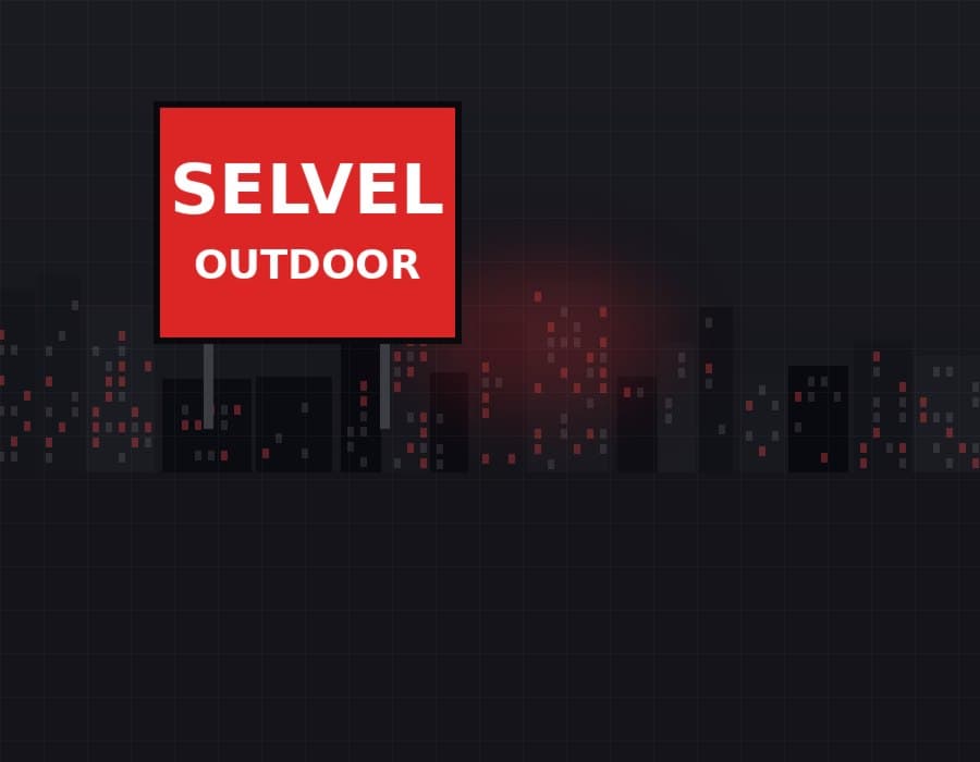 Selvel Nxt Media team reviewing a billboard installation plan